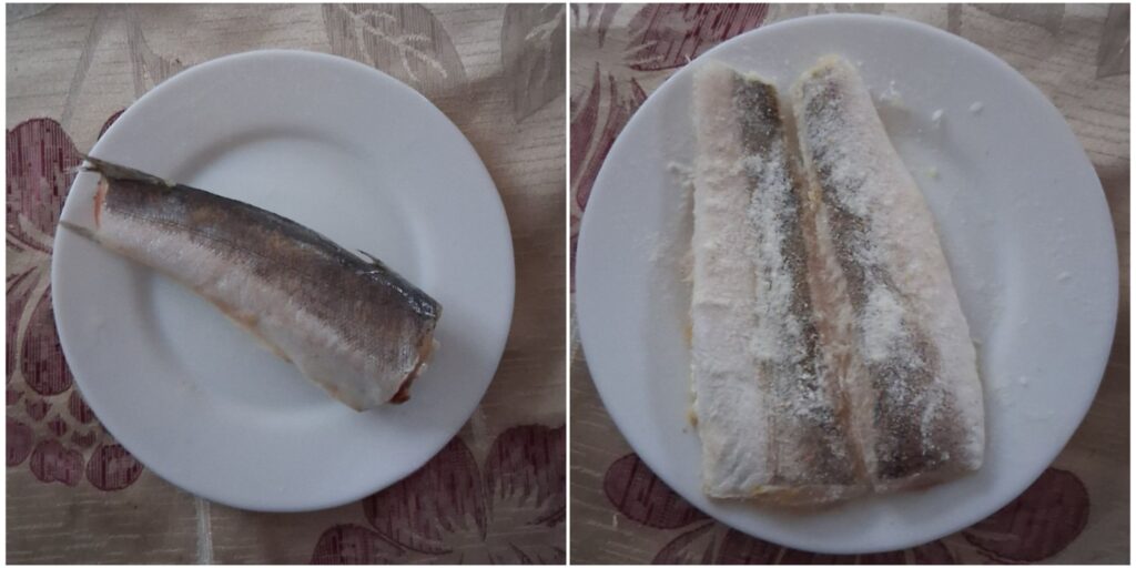 Whole hake tail and fillet coated with spelt flour, ready for baking.