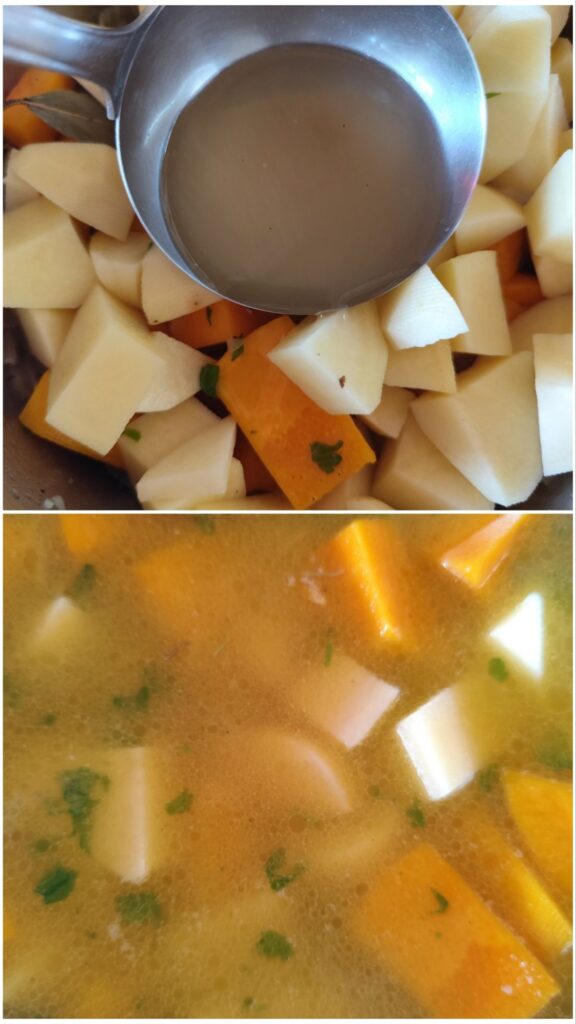 Chicken broth poured over the vegetables in the pot, ready to simmer.