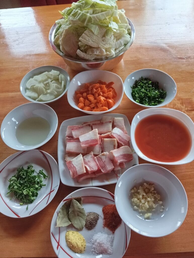 All ingredients chopped and prepared on a wooden surface, ready for cooking.