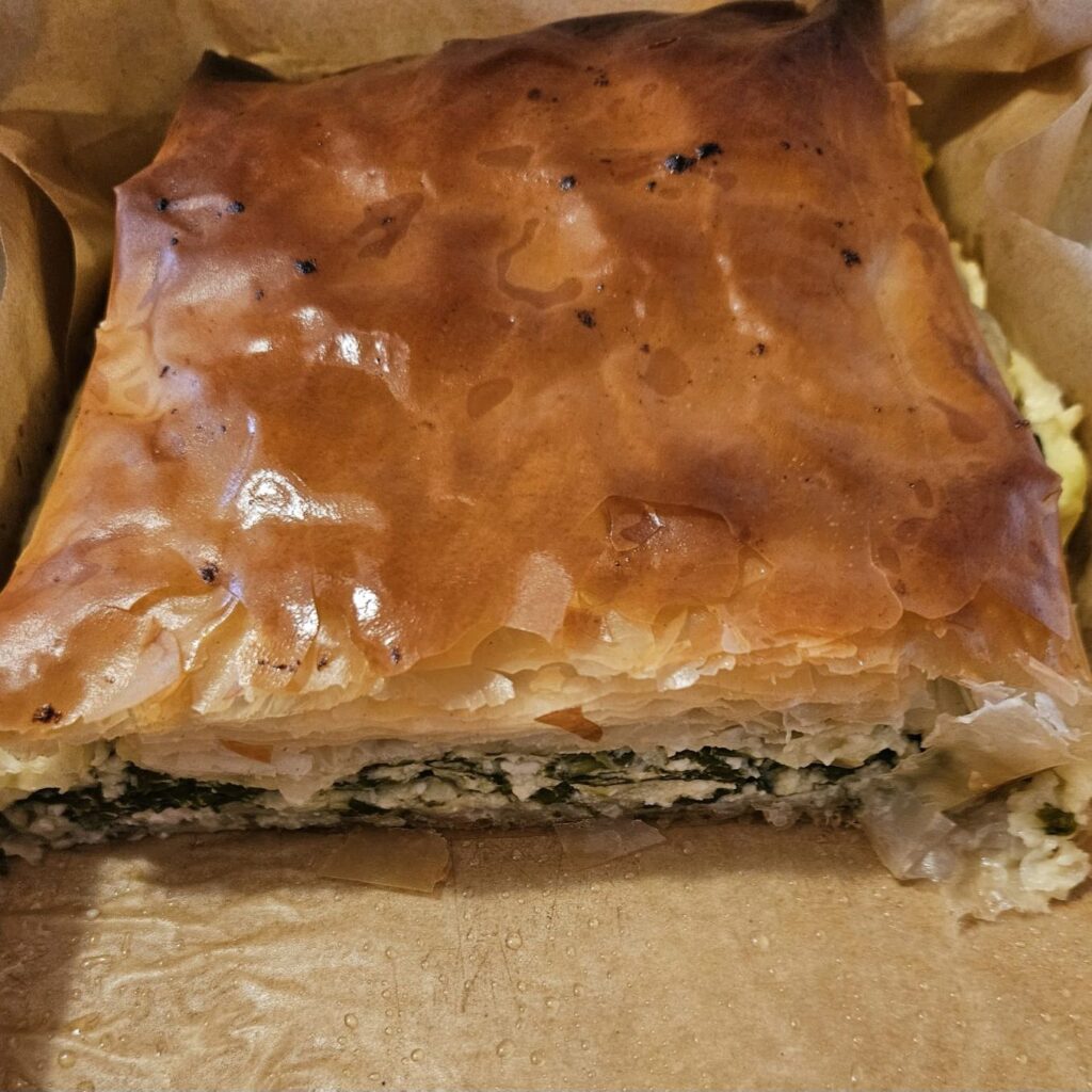 Freshly baked Spinach Cheese Pastry Delight in a golden, crispy phyllo crust.