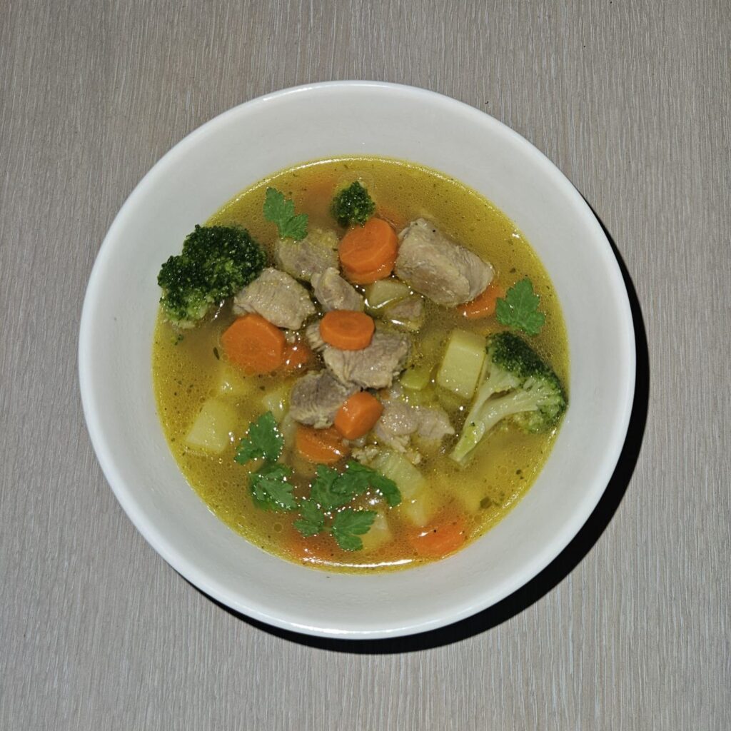 A bowl of freshly made Turkey Broccoli Root Soup.