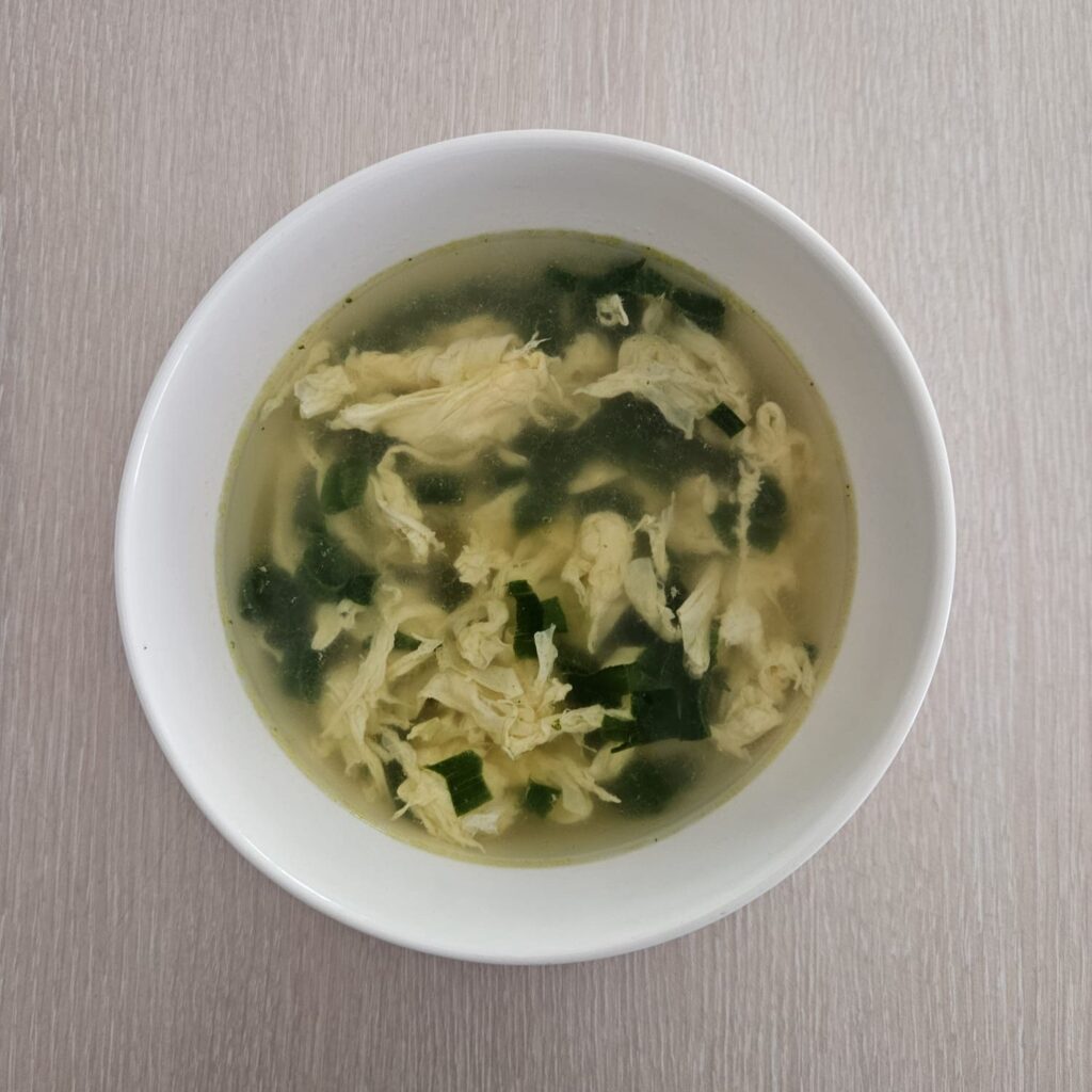 Clear Egg and Spring Onion Soup served in a bowl, light and comforting.