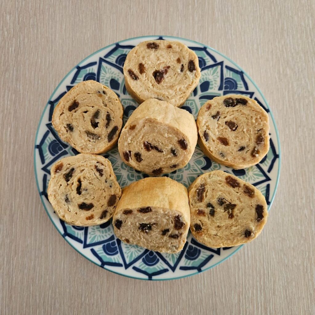 Wafer Rolls with Raisins served on a plate, photographed from above.