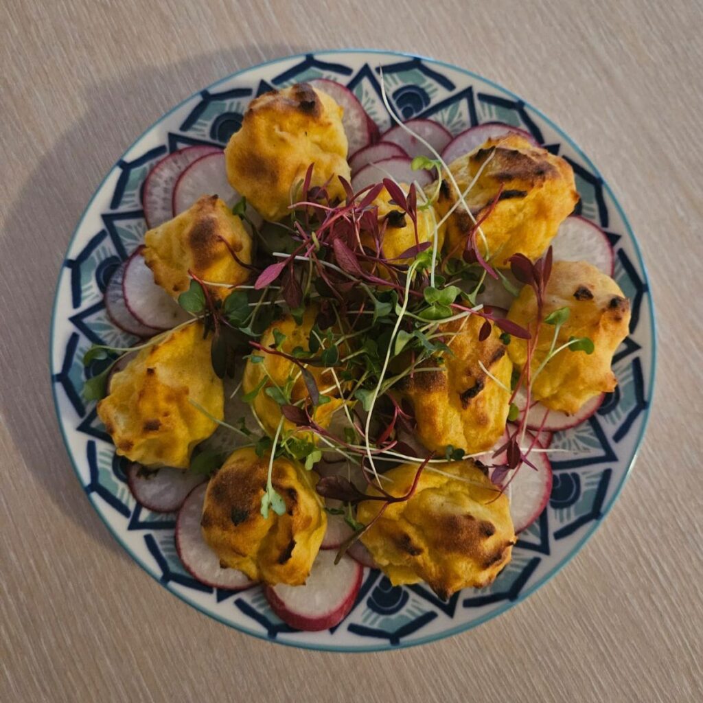 Microgreens Potato Radish Delight with baked potato balls, crunchy radishes, and colorful mixed microgreens.
