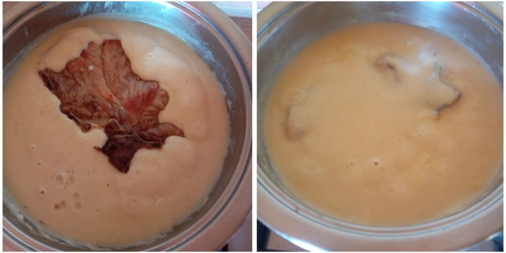 Returning the pork neck to the creamy sauce in the pan and the finished dish simmering gently.