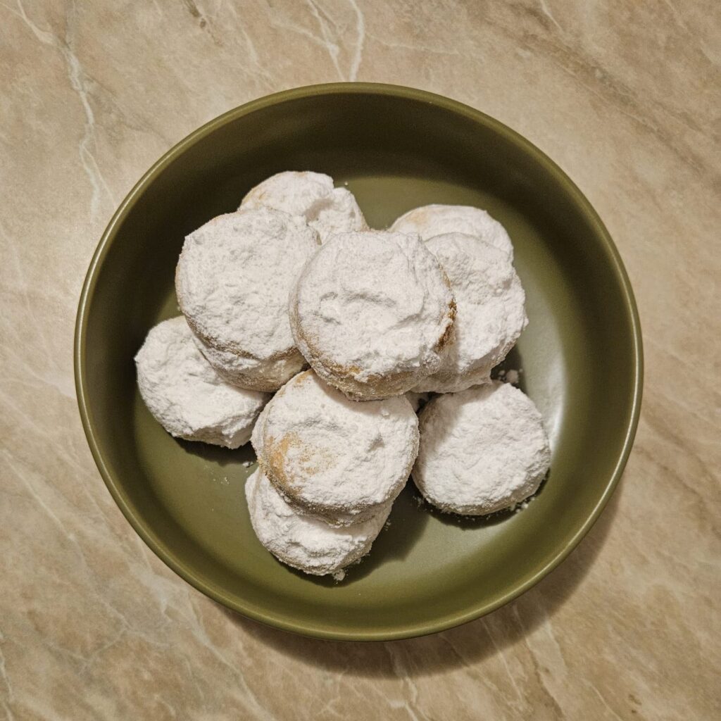 A plate filled with freshly Baked Jam Sandwich Cookies, neatly arranged and ready to be enjoyed.
