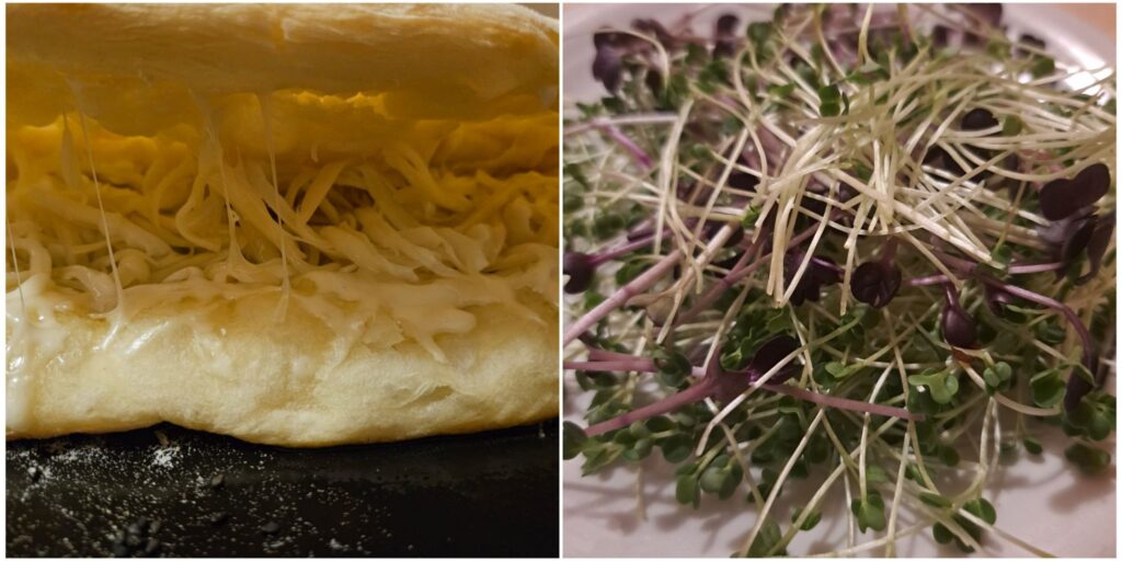 Partially opened dough filled with grated cheese placed next to a plate of microgreens ready for filling.